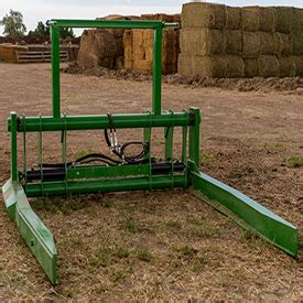 skid steer square bale attachment|skid steer squeeze attachments.